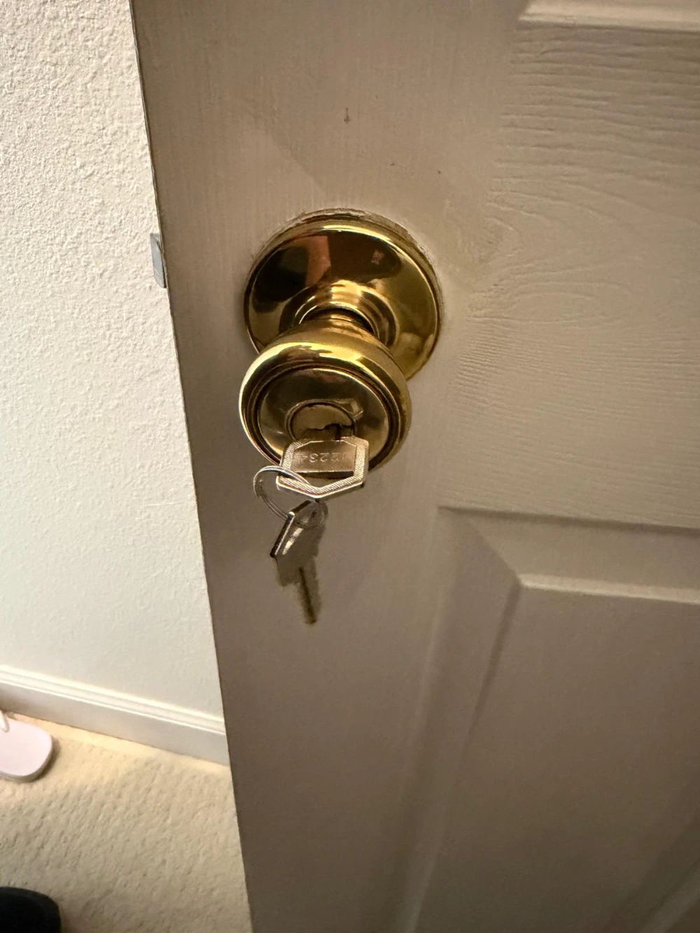 Stiff lock being replaced on a home near Alaqua Lakes